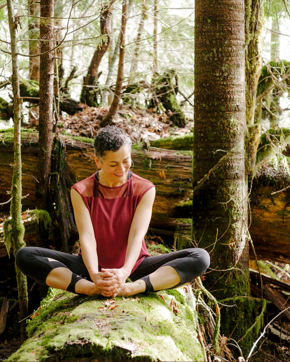 Yoga teacher practicing outdoors